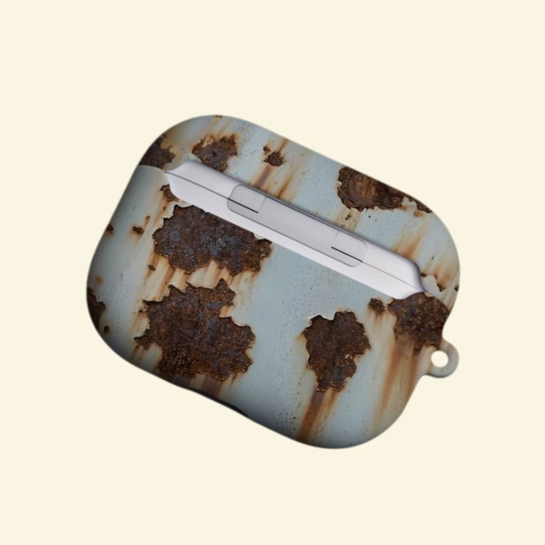 The Corroded Steel — Vintage Industrial Rusted Metal Hard Case for AirPods Pro 3 & AirPods 4 - Carapace StudioAirPods CaseCarapace StudioCarapace StudioAirPods Pro 3Corroded Steel AirPods case open with earbuds