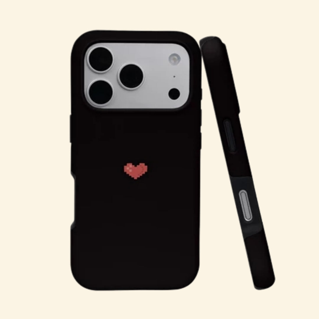 The Pixel Case Retro Pixel Heart – floating angled view showing 8-bit heart on matte black