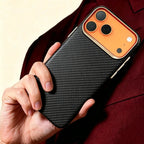 Specimen No. 10552 — Obsidian Gold Twill Aramid Case for iPhone - Carapace StudioiPhone CaseCarapace StudioCarapace StudioCS-10552-OBSIDIAN-GOLD-1iPhone 17 Pro MaxSpecimen No. 10552 Obsidian Gold Aramid iPhone Case — lifestyle hand hold in burgundy suit