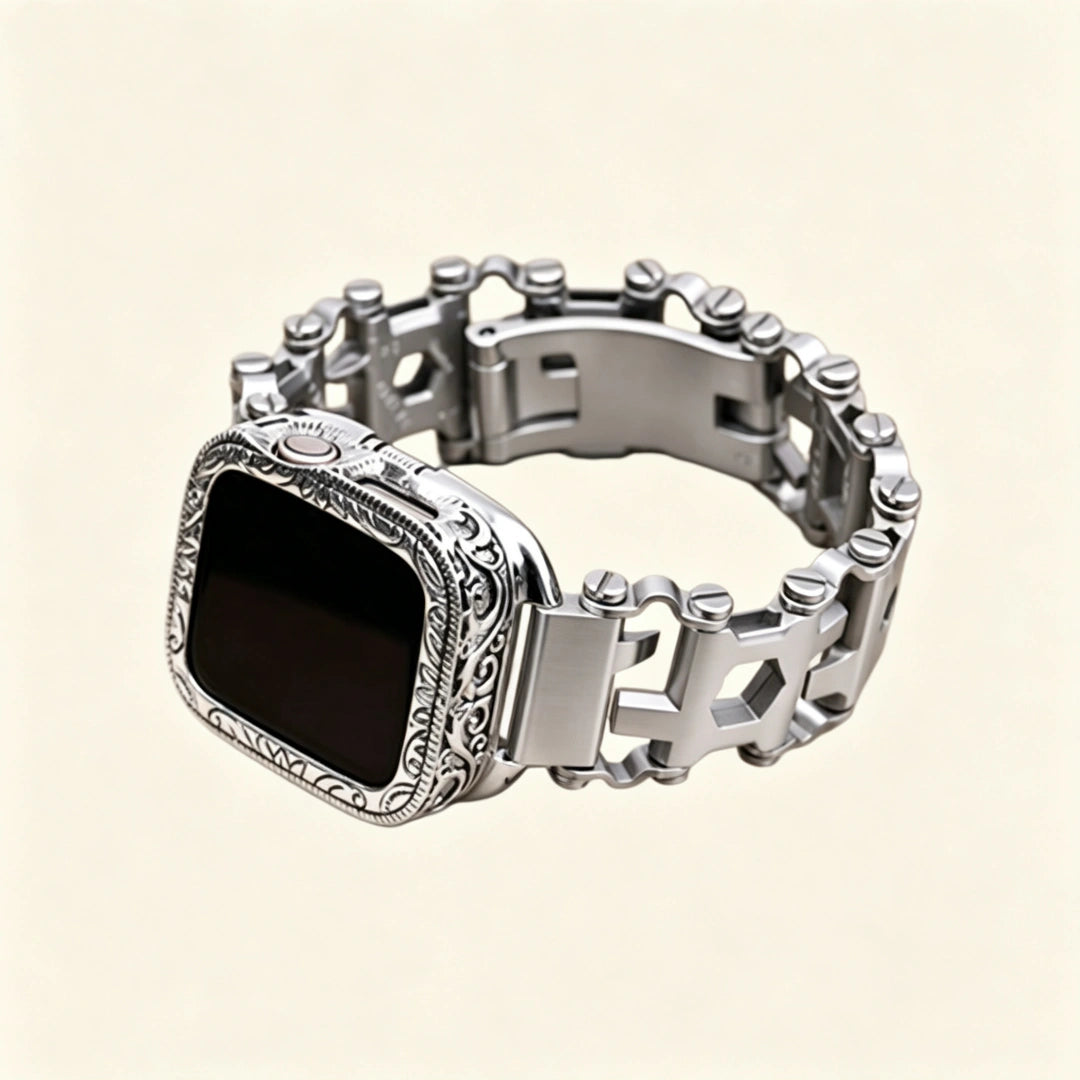 Stainless steel multitool bracelet close-up — double-locking foldover deployment clasp open, showing butterfly mechanism and engraved link detail