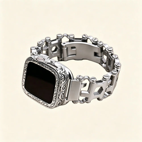 Stainless steel multitool bracelet close-up — double-locking foldover deployment clasp open, showing butterfly mechanism and engraved link detail