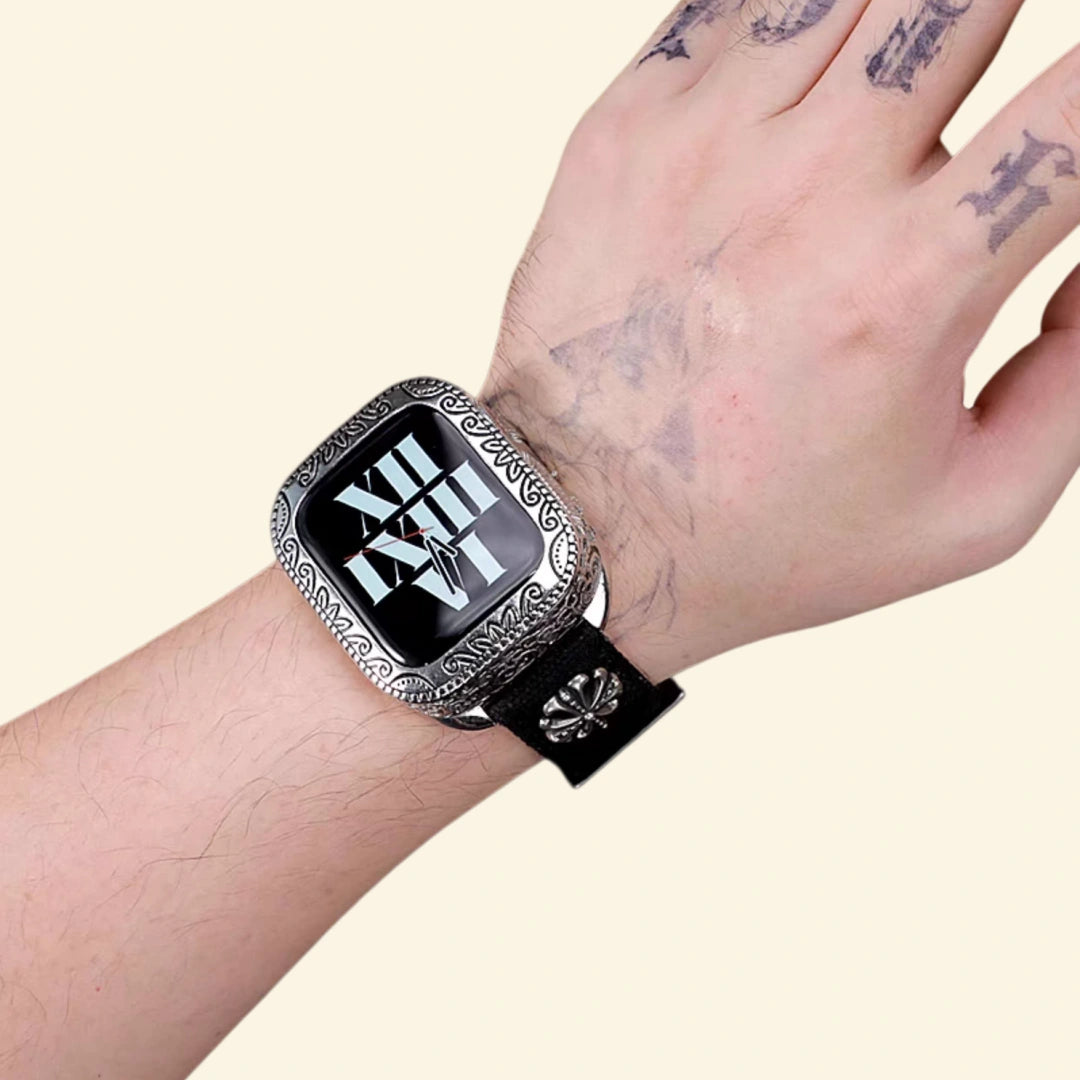 Baroque Archival Suite on wrist — silver engraved case with khaki canvas strap, roman numeral watch face