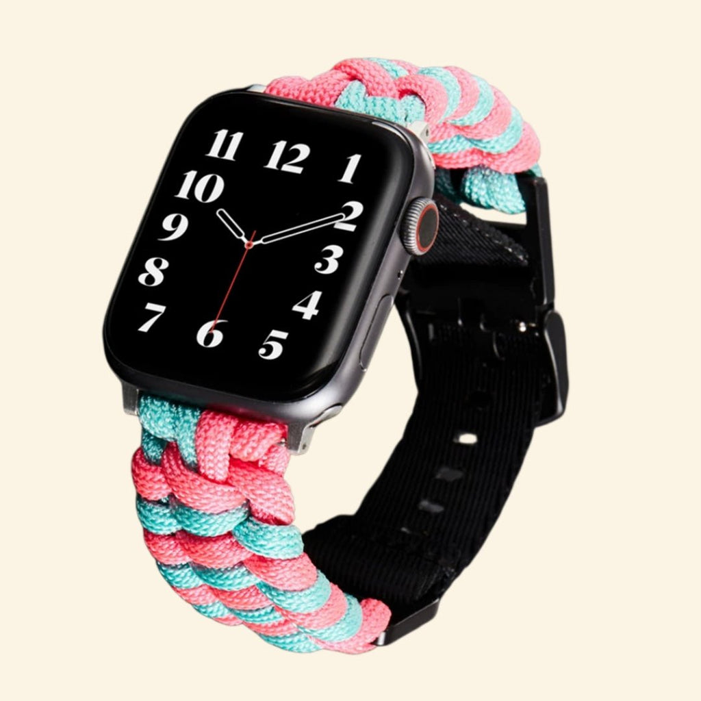 Pink & Teal Paracord Braided Band for Apple Watch — Specimen No. 10313 - Carapace StudioApple Watch BandCarapace StudioCarapace StudioCS-10313-PCRD-PKT-AW-1Apple Watch Ultra 3 (49mm)Pink & Teal Paracord Braided Apple Watch Band — angled side view on Apple Watch showing vivid pink and cyan teal dual-tone braid, Specimen No. 10313