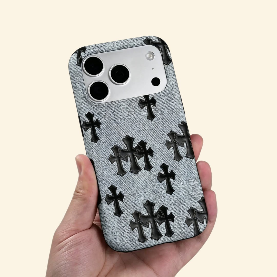 Denim Crucifix – Washed Denim & Gothic Leather Crosses iPhone Case - Carapace StudioPhone CaseCarapace StudioCarapace StudioCS-1505-DENIM-CRUCIFIX-5iPhone 16 Pro MaxDenim Crucifix case – hand-held lifestyle shot showing full cross pattern