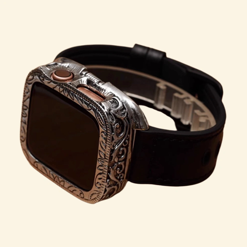 Baroque silver case with matte black hybrid strap — three-quarter wrist angle showing scrollwork bezel and strap integration