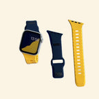 Dual-Tone Ocean Wave Silicone Apple Watch Band — Specimen No. 7601 - Carapace StudioApple Watch BandCarapace StudioCarapace StudioCS-7601-YLW-NVY-1Apple Watch Ultra 3 (49mm)Solar Dual-Tone Apple Watch Band — flat lay with watch, navy and yellow band components on cream background