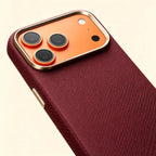 Specimen No. 10555 — Burgundy Woven Aramid Case for iPhone - Carapace StudioiPhone CaseCarapace StudioCarapace StudioCS-10555-BURGUNDY-1iPhone 17 Pro MaxSpecimen No. 10555 Burgundy Woven Aramid iPhone Case — gold camera bezel close-up angle