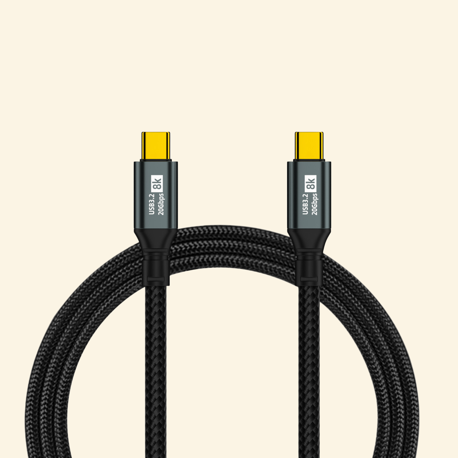 100W 20Gbps 8K USB-C braided data cable — both gold-plated USB-C connectors shown with gunmetal alloy housings labeled USB3.2 20Gbps 8K, coiled black high-density braided nylon cable on cream background
