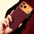 Specimen No. 10555 — Burgundy Woven Aramid Case for iPhone - Carapace StudioiPhone CaseCarapace StudioCarapace StudioCS-10555-BURGUNDY-1iPhone 17 Pro MaxSpecimen No. 10555 Burgundy Woven Aramid iPhone Case — lifestyle hand hold in burgundy suit