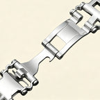 Baroque Archival Suite No. 10824 — silver engraved case with stainless steel multitool bracelet, angled product shot showing case and bracelet integration