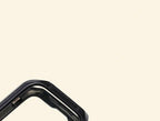 Glossy Onyx Black Rivet Case for Apple Watch — Specimen No. 10541 - Carapace StudioApple Watch CaseCarapace StudioCarapace StudioCS-10541-ONYX-RVT-AW-1Apple Watch Ultra 3 (49mm)Glossy Onyx Black Rivet Apple Watch Case — top corner rivet accent close-up, Specimen No. 10541