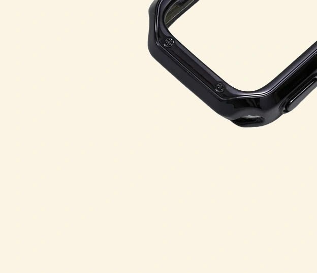 Glossy Onyx Black Rivet Case for Apple Watch — Specimen No. 10541 - Carapace StudioApple Watch CaseCarapace StudioCarapace StudioCS-10541-ONYX-RVT-AW-1Apple Watch Ultra 3 (49mm)Glossy Onyx Black Rivet Apple Watch Case — bottom corner rivet and button cutout detail, Specimen No. 10541