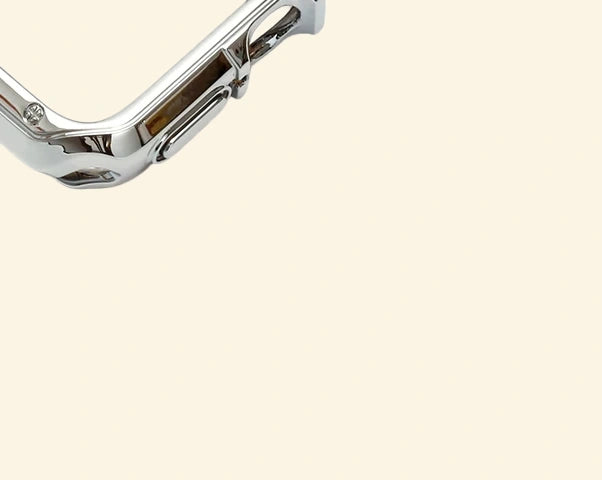 Polished Chrome Silver Rivet Apple Watch Case — top corner crown cutout close-up, Specimen No. 10545