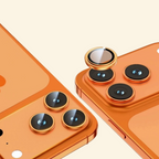 Rose gold aluminum alloy camera lens ring protectors — two iPhones side by side showing quad-lens and triple-lens camera modules with lens rings installed, one ring shown being lifted off, cream background